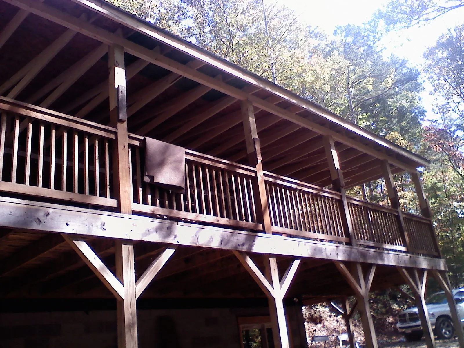 Timber framing under a new elevated porch and deck in Morganton